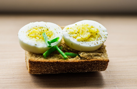 Sandwich with boiled egg and green onion