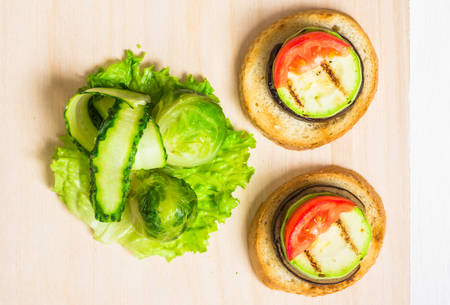 Appetizer tapas with zucchini and eggplants on toast top viewの写真素材
