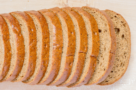 Loaf rye bread, cut into pieces for background