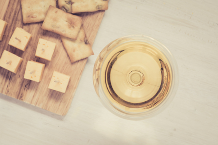 White wine and cheese top viewの写真素材