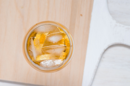 Wineglass of white sangria with lemon view from aboveの写真素材