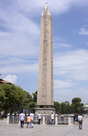 ISTANBUL - August 3, 2014.  People walking around the Obelisk of Theodosius. On August 2014 in Istanbul, Turkeyのeditorial素材