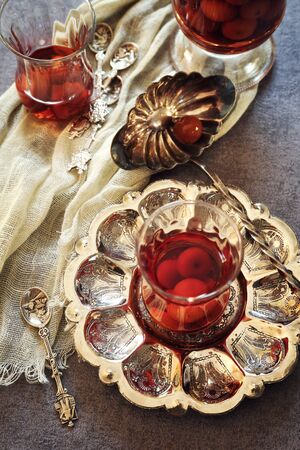 Cherry Eau de vie: french fruit brandy. Toned imageの写真素材