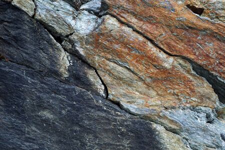 Background: stone multicolored rock texture