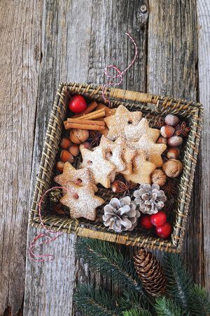 Christmas cinnamon cookies in basket. Top viewの写真素材