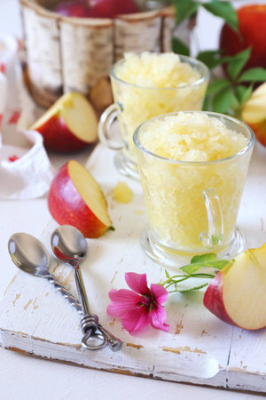 Apple granita, frozen summer dessert, selective focus, two cupsの写真素材