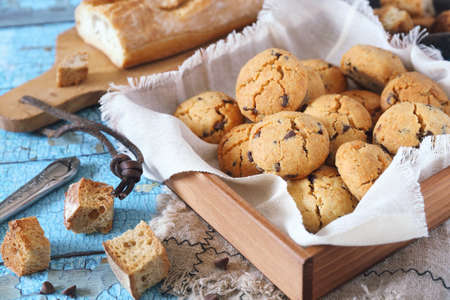 Homemade chocolate chip cookies from stale bread in wooden box