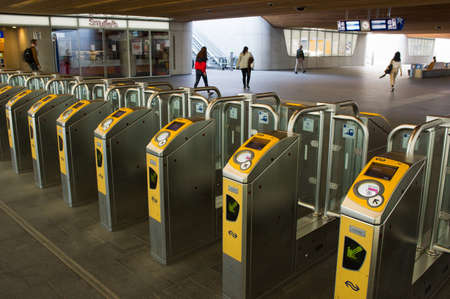 Arnhem, Netherlands - April 16, 2020: Public transport check in / out gates at central station...
