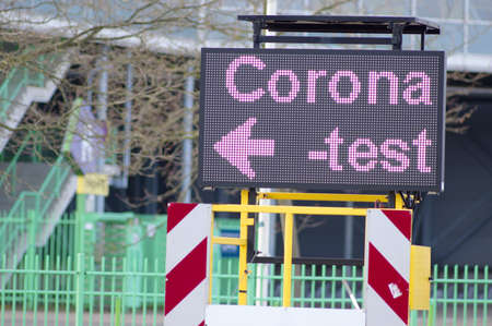 Dutch corona test street information sign ito indicate a test center. Translation: test street means...
