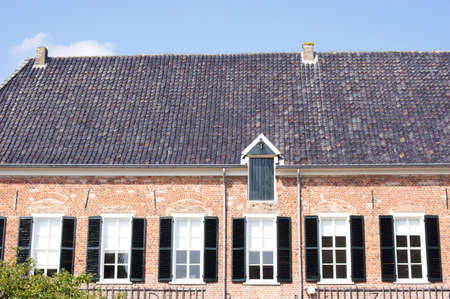 Roof with black roof tiles of medieval house of castle Bergh in 's-Heerenberg in the Netherlands