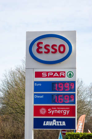 Arnhem, Netherlands - January 28, 2022: Large information pillar with fuel prices and Spar...