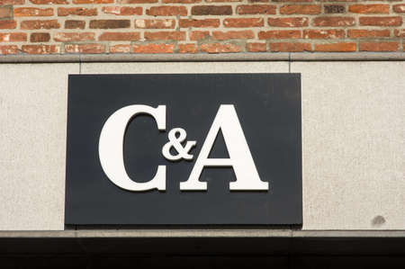 's-Hertogenbosch, Netherlands - February 12, 2022: Logo of the C&A clothing store on the facade of the building in shopping streetのeditorial素材