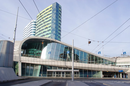 Arnhem, Netherlands - January 6, 2023: Facade of station Arnhem central with a cloudy backgroundのeditorial素材