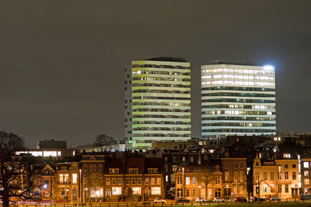 Arnhem, Netherlands - January 26, 2023: The two modern WTC towers in the center of Arnhem at nightのeditorial素材