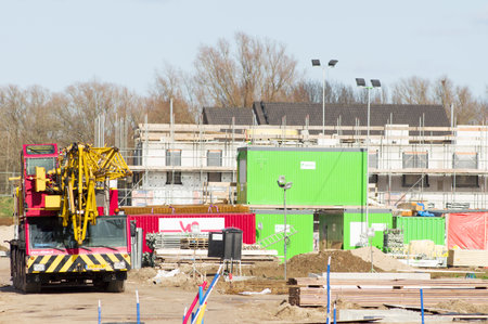 Arnhem, Netherlands - February 25, 2013: Construction site with a skeleton of a building and a craneのeditorial素材