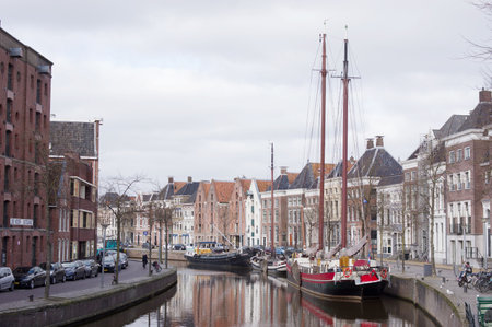 Groningen, Netherlands March 3, 2023: Old historic ships in the canals in the center of Groningenのeditorial素材
