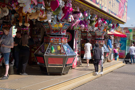 Arnhem, Netherlands - May 13, 2023: people enjoy on a dutch fair with colorful decoration in Arnhemのeditorial素材