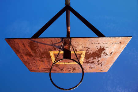 It's of course a rusty basketball post but if you have an abstract imagination and associativity you will see the silhouette of a toy paper ship. Shot in Komsomolsk, Ukraine.の写真素材