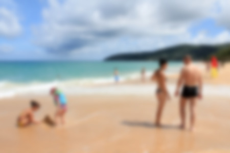 In the summer vacation of couple walking on the beach .の写真素材