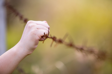 Women praying on a blurred background. Hope conceptの写真素材