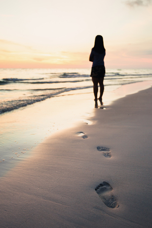 Footprints on the sands of lonely people. Verticalの写真素材