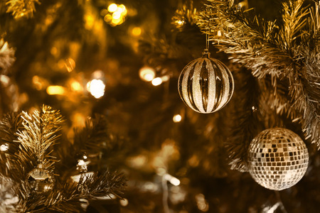 Christmas tree and beautiful decoration. Gold tone style. Festival celebration Christmas and New Yearの写真素材