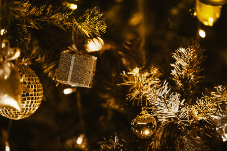 Christmas tree and beautiful decoration. Gold tone style. Festival celebration Christmas and New Yearの写真素材