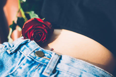 Rose on the girl body. Old rose concept waitingの写真素材