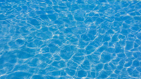 abstract blue water texture for background reflection on the blue water surface in the sea