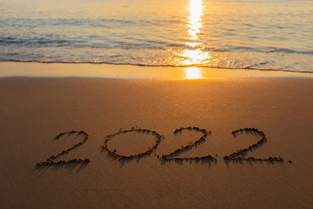 2022 on the beach happy new year on nature backgroundの写真素材