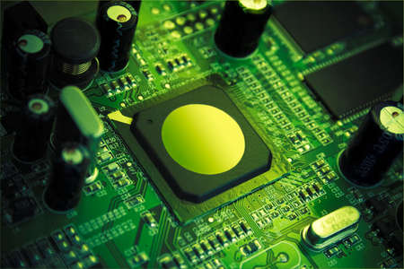 Futuristic high technology chip, surrounded by capacitors, microcircuitry & quartz. Image in beauty...