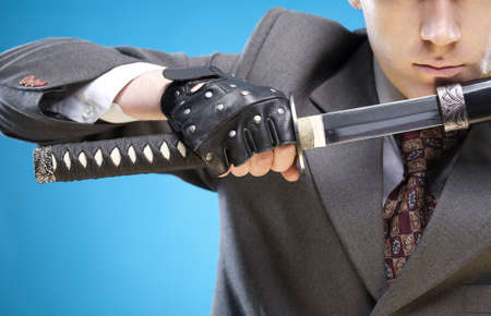 Conceptual business image. Young businessman close-up ready to start business struggleの写真素材