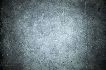 Cold spooky cardboard stained folded background with dark bordersの写真素材