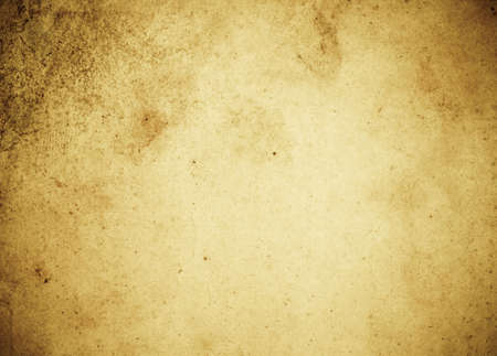Old-fashioned vibrant color paper background with dark stained bordersの写真素材
