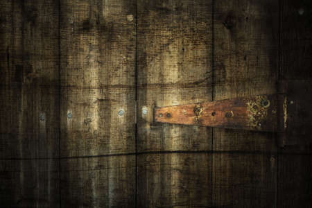 Dirty grunge awe stained backdrop with dark borders and rusty metal partの写真素材