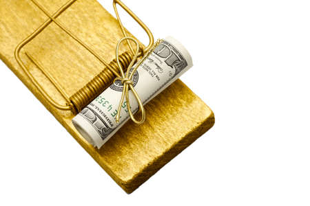Focus on money  Golden mousetrap with rolled dollar bait  Free money, risk in business, temptation, gift conceptの写真素材