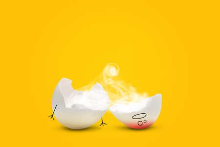 Chopped egg character with fallen off head and smoke inside. Burned out on work, stress conceptの写真素材
