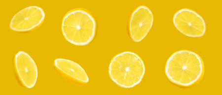 Slices of lemon fruit pattern. Citrys slices with warm yellow colors.