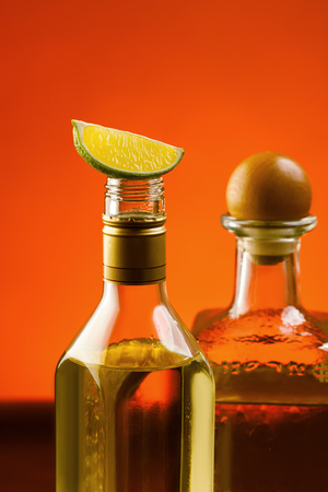 Two tequila alcohol drinks with slice of lime on top. Mexican traditional alcohol drinksの写真素材