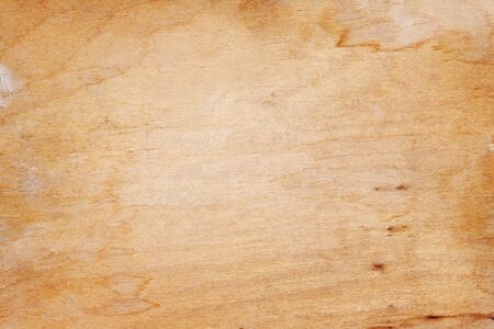 Stained wooden background with dark borders and messy texture