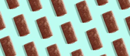 Milk chocolate candies pattern. Creative food backgroundの写真素材