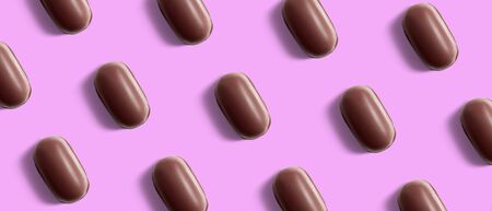 Milk chocolate candies pattern. Creative food backgroundの写真素材