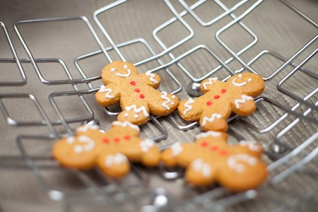 Christmas homemade gingerbread cookies on wooden table