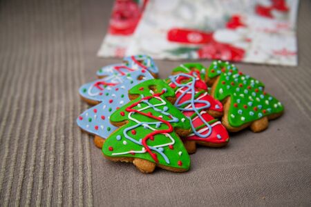 Christmas homemade gingerbread cookies on wooden table