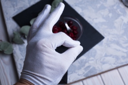 hand with white glove perfectの写真素材
