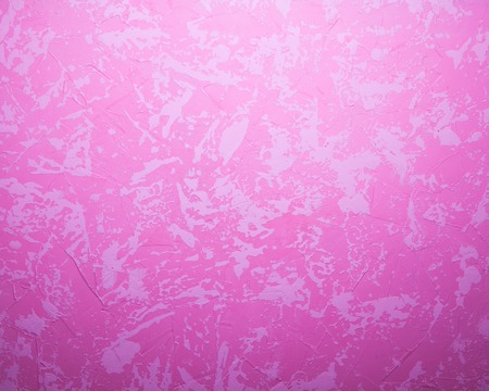 pink concrete texture with light spots on it