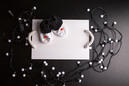 Hands wrapping Christmas presents arial view group of young diverse peopleの写真素材