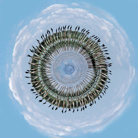 Cyclorama with cormorants sitting on poles.の写真素材