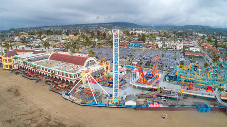 Santa Cruz Beach Boardwalkâs vintage rides and 1911 Looff Carousel and the Giant Dipper roller coaster.のeditorial素材