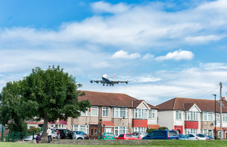 G-CIVZ British Airways Oneworld Livry Boeing 747 Landing in London Heathrow International Airport. England.のeditorial素材